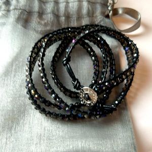 Victoria Emerson, black shimmer bracelet. You can see a little bit of purple.
